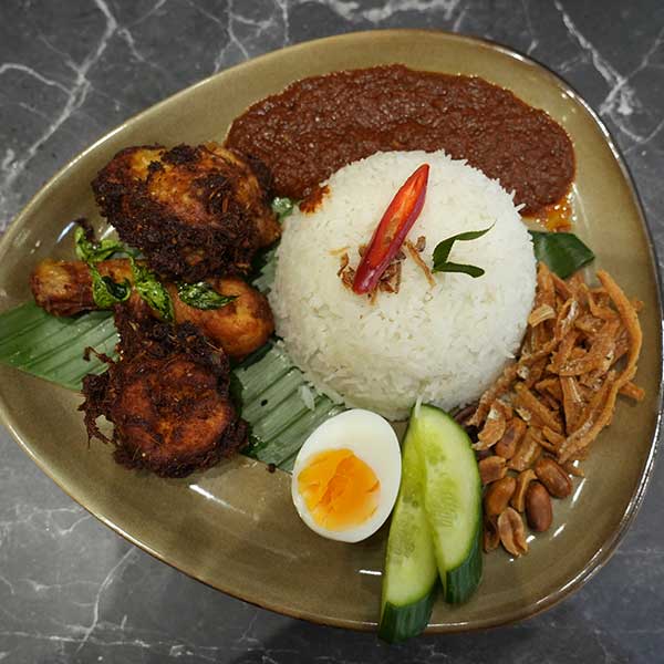 Nasi lamak with ayam goreng barampah