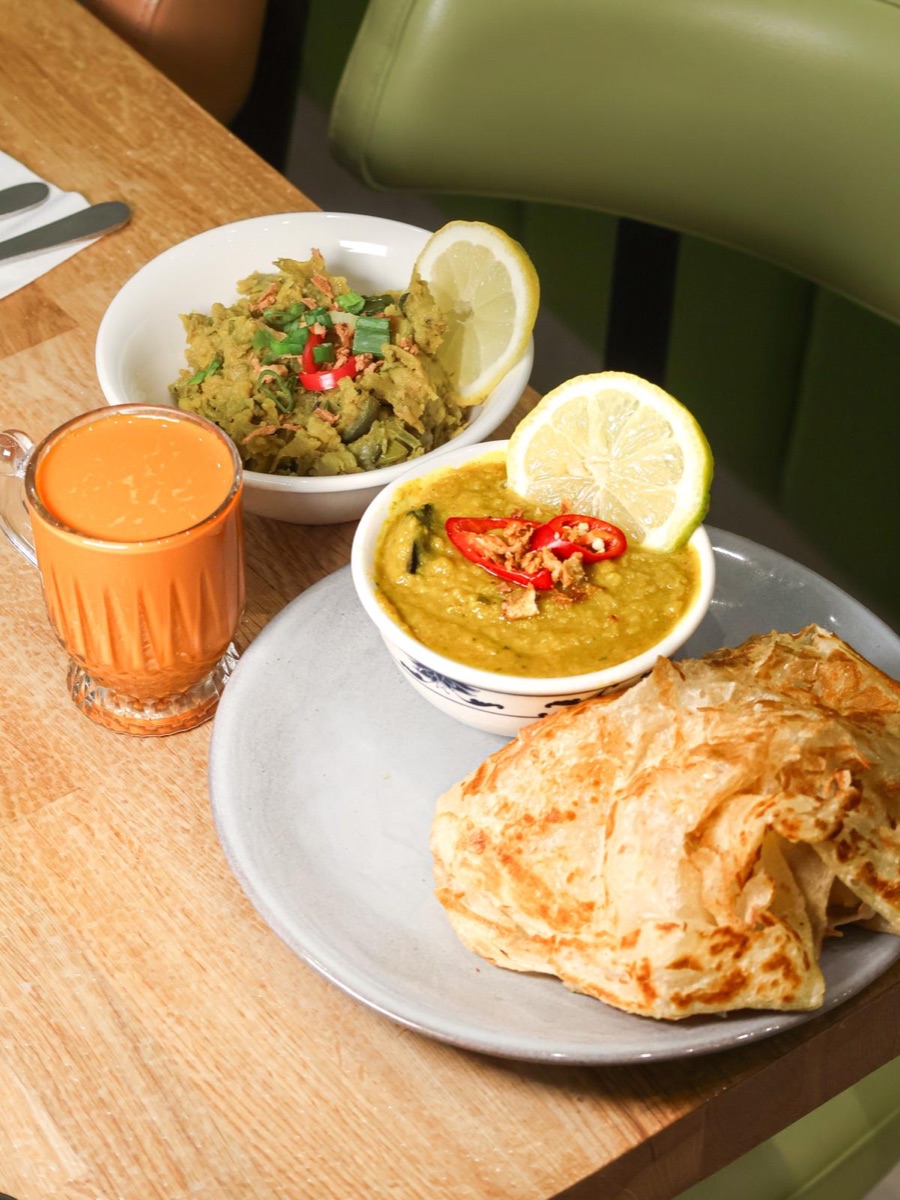 Freshly cooked roti canai with dhal curry at Penang City Forest Gate